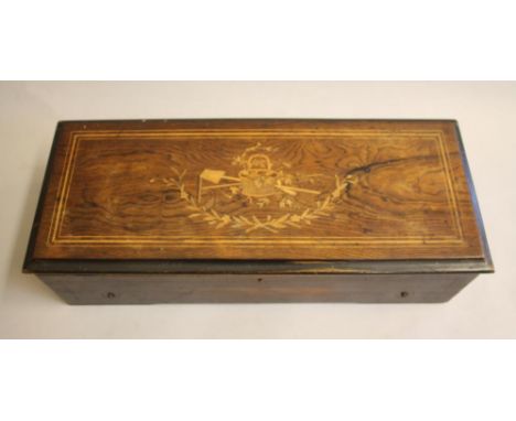 A VICTORIAN WALNUT CASED MUSICAL BOX with 10 1/2" comb and drum movement, the case with faux rosewood sides and ebony trim, t