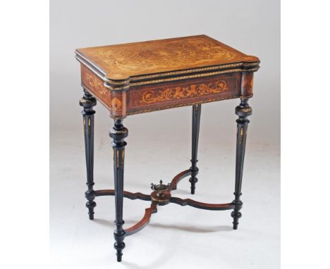 A VICTORIAN KINGWOOD AND MARQUETRY FOLDING CARD TABLE in the French revival style richly inlaid with scrolling foliage, griff