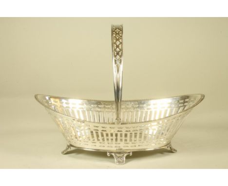 AN EDWARDIAN SILVER BASKET, makers William Hutton & Sons Ltd., London 1901, of flared oval section with plain pierced arcadin