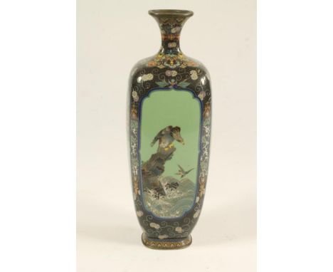 A JAPANESE CLOISONNE ENAMEL VASE, Meiji period, of rounded square section, with four drab green panels of flowering prunus an