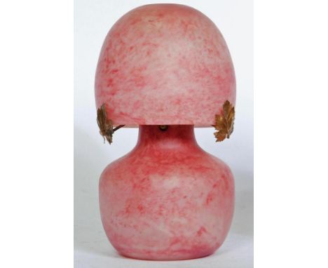 A FRENCH PINK MOTTLED GLASS ELECTRIC TABLE LAMP, c.1930's, the high domed shade with flat top supported on the original gilt 