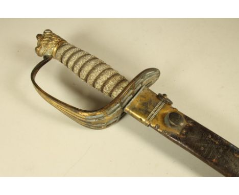 A NAVAL OFFICER'S HANGER, late 18th century, the 25" curved blade with double fuller, hilt with brass slotted guard, ribbed a