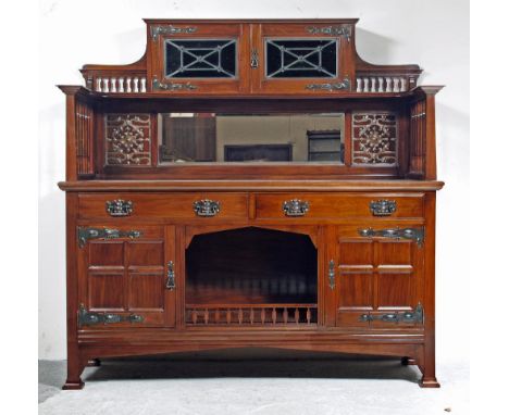 A VICTORIAN MAHOGANY ARTS AND CRAFTS STYLE SIDEBOARD, the raised shelved back extending out on either side on spindles fronte