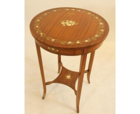 AN EDWARDIAN PAINTED SATINWOOD OCCASIONAL TABLE of circular form crossbanded with stringing, the top with central floral bouq