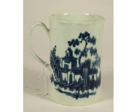 A FIRST PERIOD WORCESTER PORCELAIN MUG, c.1770, of plain cylindrical form printed in underglaze blue with the "Plantation" pa