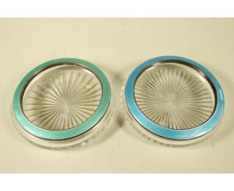 A COMPOSITE PAIR OF ART DECO SILVER SMALL DISHES, maker possibly William Comyns, Birmingham 1928/9, the clear glass shallow b