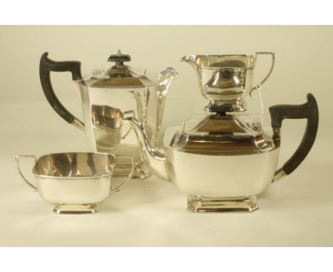 A COMPOSITE FOUR PIECE SILVER TEA SERVICE, maker A.L. Dennison, Birmingham 1938/9, of canted oblong form on a low foot, compr