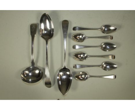 A LATE GEORGE III SILVER TABLESPOON, maker Hester Bateman, London 1785, in Old English pattern engraved IFE*, together with a