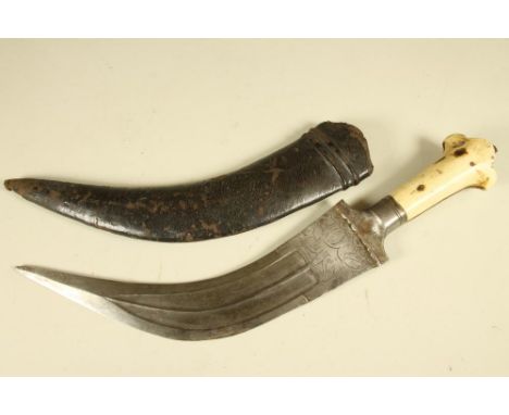 AN INDIAN JAMBIYA DAGGER, late 19th/early 20th century, with 9" floral etched blade, shaped two piece bone grip and leather s