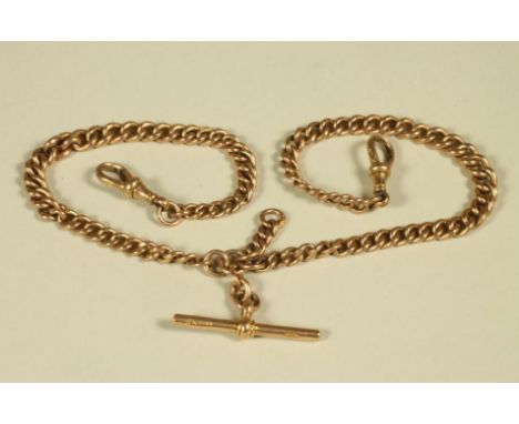 A 9CT GOLD CURB LINK DOUBLE ALBERT CHAIN, with bar and two dog clip fasteners, each chain 7" long, 41.4g total
