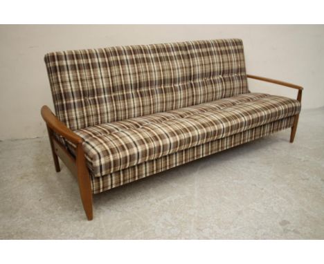 A SCANDINAVIAN DESIGN TEAK FRAMED SOFA BED button upholstered in a black, brown and white wool check, loose back and seat cus