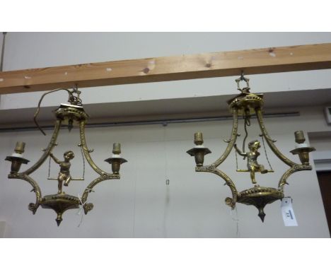 Pair of two branch light fittings modelled as cherubs on swings H43cm