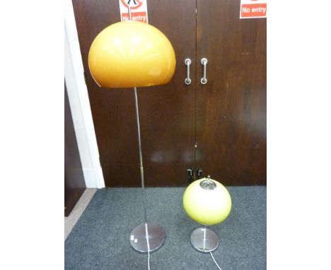 Retro chrome effect floor lamp with plastic orange dome shade and a similar table lamp