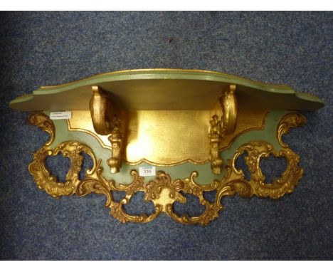 Ornate Belgian gilt shelf L73cm 