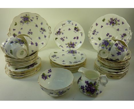 Hammersley & Co. tea service decorated with violets  Condition Report 8 cups
12 saucers
12 side plates
6 18cm diameter plates