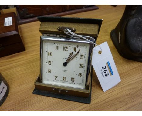 Smiths Art Deco period alarm clock, its case in the form of a leather bound book  'Pageant of the Hours' H10cm 