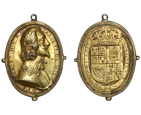 Charles I, a cast and chased silver-gilt Royalist badge, unsigned, bare-headed bust right surrounded by engraved legend, caro