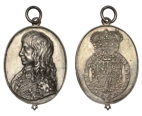 Charles, Prince of Wales, a cast and chased silver Royalist badge by T. Rawlins, bare-headed bust left wearing richly decorat