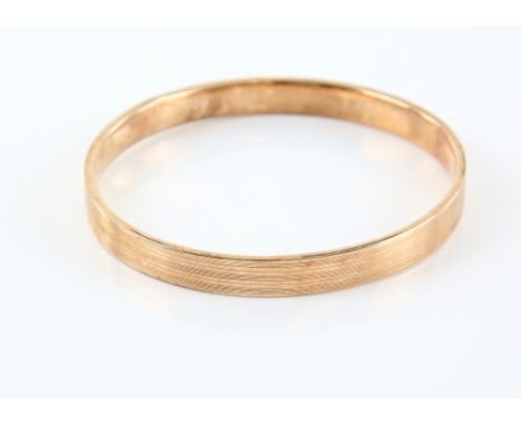 1920's gold flapper girl bangle, engine turned decoration, hallmarked Birmingham 1920, makers mark AJ for Albert Jackson, in 