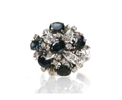 Vintage floral cluster ring, set with six oval cut green sapphires and Swiss cut diamonds, mount test as 9 ct, white gold, ri