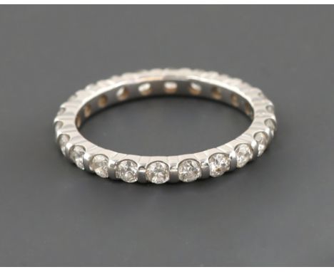 Diamond full eternity ring, round brilliant cut diamonds, estimated total diamond weight 0.80 carats, mounted in 18 ct white 