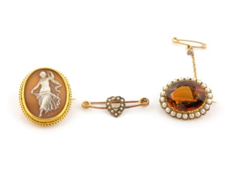 Three antique brooches, one shell cameo, depicting a dancing lady, with wire work frame, another set with oval cut citrine an
