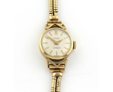 A Majex ladies wrist watch in 9 ct gold case the signed dial with gold batons and fitted with a 21 jewel incabloc movement,ha