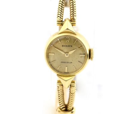 Rolex ladies precision ref 9444  ladies wristwatch in 18 ct gold case , the signed brushed gold dial with baton hour markers,