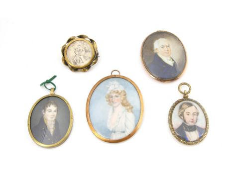 Four antique portrait miniatures, one oval form painting of gentleman in 19th C dress, mount testing as 9 ct gold, two simila