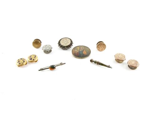 Two gold buttons with enamel floral design, testing as 15ct gold with a higher wash, three gold front buttons, a Scottish har