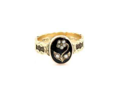 Early 19th C mourning ring, central oval black enamel panel with seed pearl set flower, engraved band with hair work sections