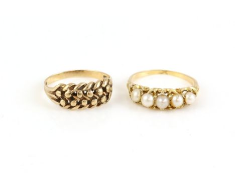 Two rings, Victorian white pearl ring with scrolled gallery, in yellow metal testing as 18 ct, size P and a keeper ring, in 9
