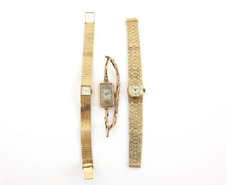 Three ladies gold watches, Rotary and Berkeley both on integrated bracelet straps, and an early 20th century watch on an expa