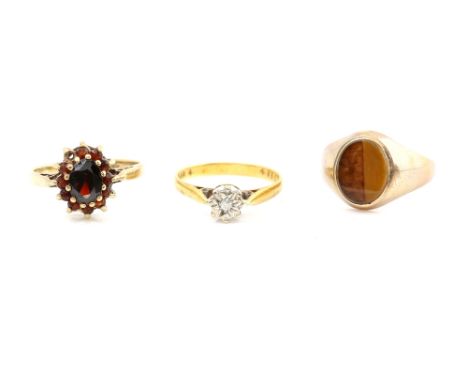 Three rings, one vintage diamond single stone, mounted in 18 ct and platinum, ring size I, 1970's tigers eye signet ring and 