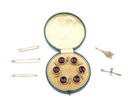 A cased set of antique shirt buttons set with agate in gilt metal, three gold tie pins, two watch holder brooches, 9 ct, .   