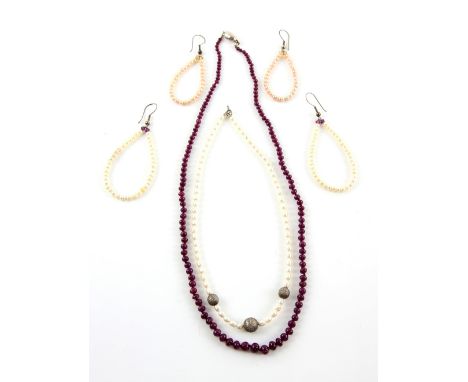 A ruby necklace, the graduated beads from 3-7 mm, length, 57 cm, a cultured pearl necklace with silver  beads and pearl hoop 