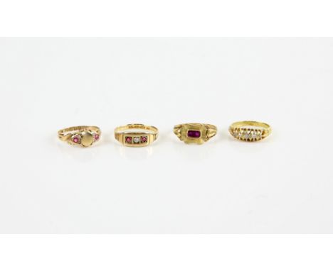 Victorian mourning ring with central foiled back stone, reverse with inscription dated 1847, a five stone diamond ring, and t