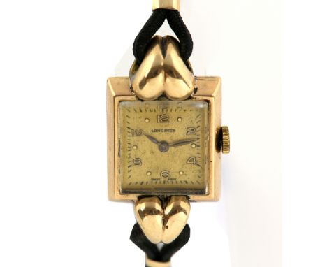 Longines ladies wrist watch, with a 9 ct  gold rectangular case,the signed dial with Arabic numerals, bead hour markers and m