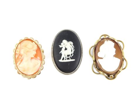 Three brooches, one vintage shell cameo, in 9 ct gold mount  4.5 x 3.5cm, with pin and roll catch fitting, another similar Vi