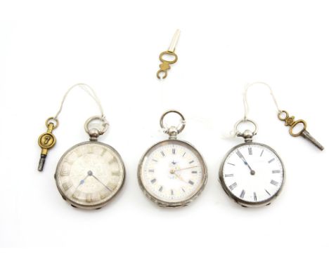 Edwardian pocket watch the silver dial with Roman numerals, key wound movement, and two similar pocket watches  one with enam