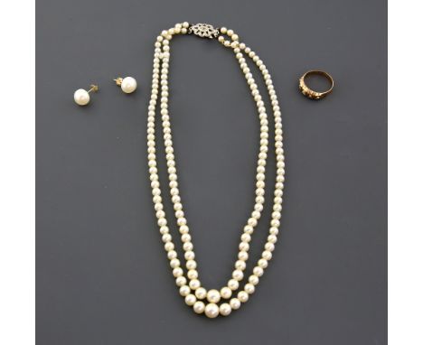 A double row necklace of cultured pearls to a white gold clasp set with small rose cut diamonds, a Victorian yellow gold pear