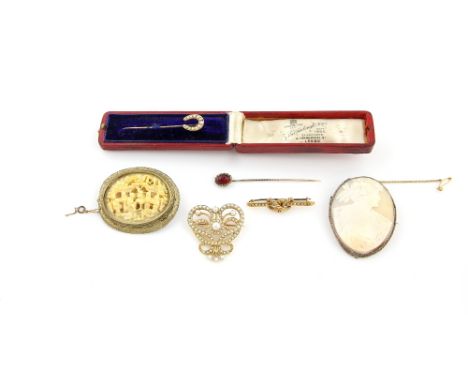 Antique seed pearl set jewellery, a bar brooch in 15 ct, horse shoe pin, and pendant, both gold, a shell cameo and carved bon