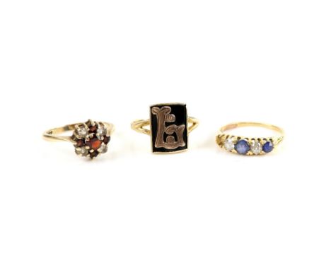 Three gold rings, one Victorian sapphire and diamond set, mounted in 18 ct, ring size J, enamel monogram ring and red and whi