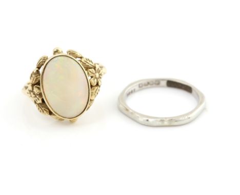 Two rings, vintage white gold band, ring size K, in 18 ct and opal ring,with  oval cabochon cut stone 13 x 9mm, rub over set,