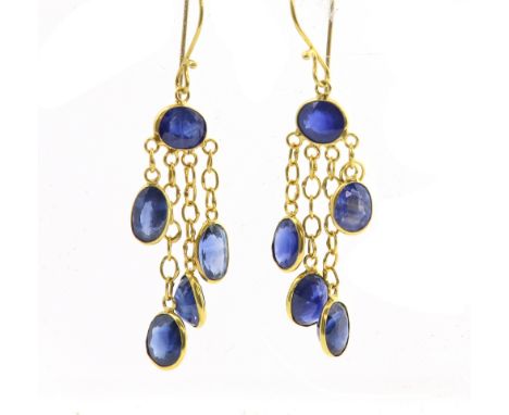 Sapphire set chandelier drop earrings, with single round stones and four oval drops at various lengths, 14 ct gold  .     