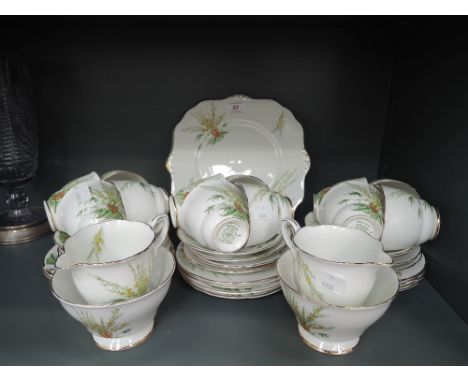 A vintage part tea service by Royal Stafford in the Broom pattern