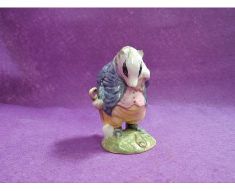 A Beswick Beatrix Potter figure, Tommy Brock, spade out, variable eye patch BP2