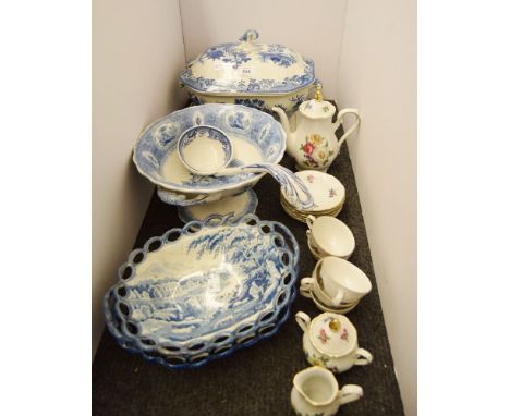 A 19th century blue and white pottery tureen cover and stand, 25cm high, a blue and white pottery pedestal bowl, 28cm diamete