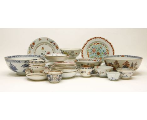 A collection of Chinese imari and famille rose ceramics, 18th century, comprising punch bowls, bowls, tea bowls and saucers, 