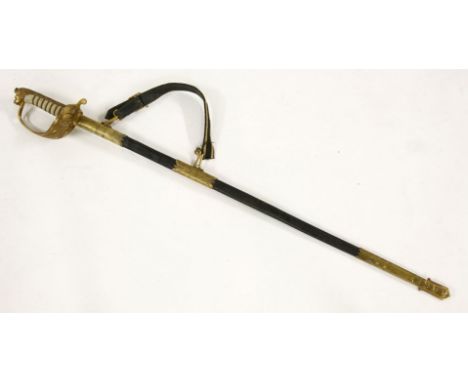 A Royal Navy Officer's sword and scabbard with shagreen grip and brass lion pommel. 99cm long